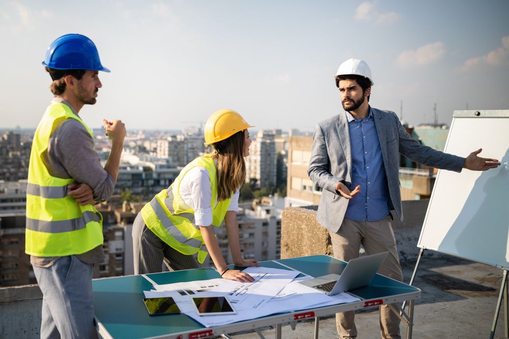 team collaborating at job site