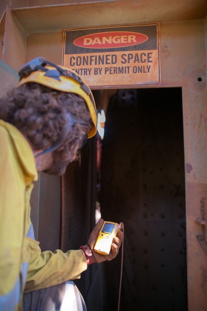 man monitoring confined space entry