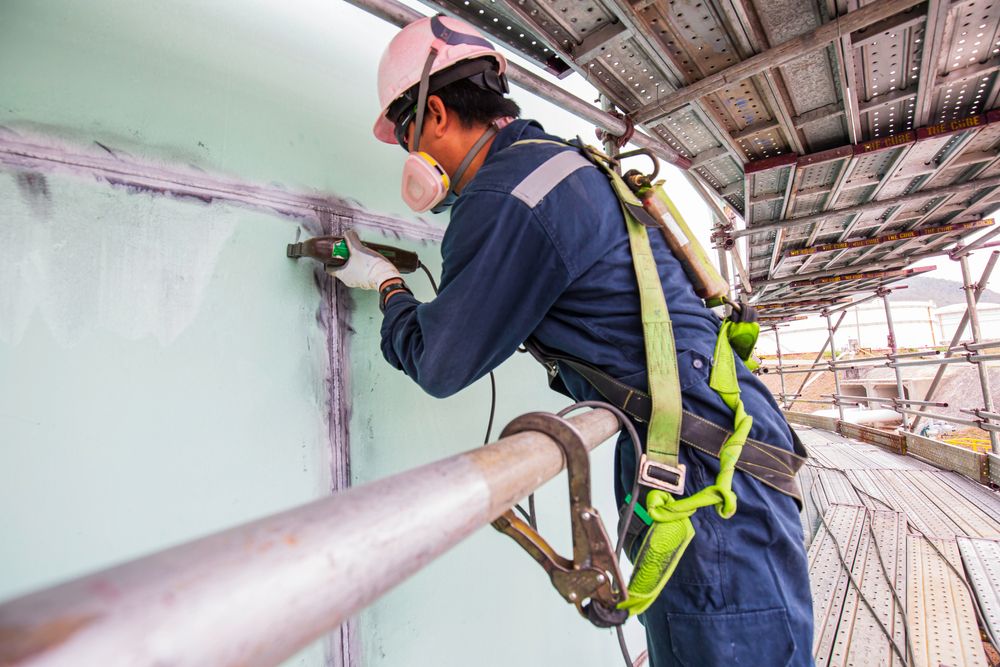 maintenance man working at heights