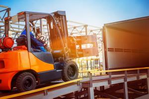 forklift loading onto truck